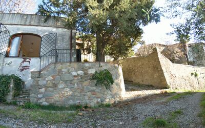La Cipressa: Wall, Property, Building, Tree, House, Ruins, Architecture, Land Lot, Stone Wall, Rock