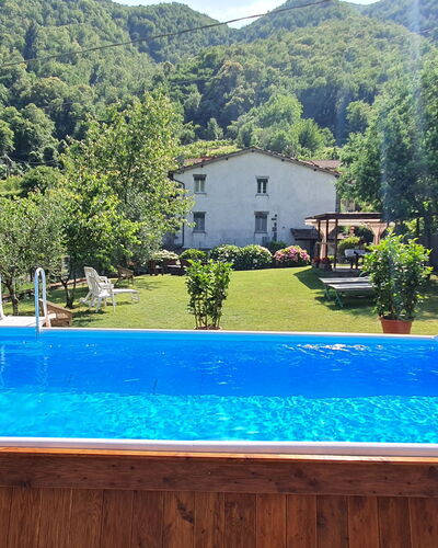 Casa Irene: Water, Plant, Property, Swimming Pool, Mountain, Blue, Building, Green, Nature, Azure