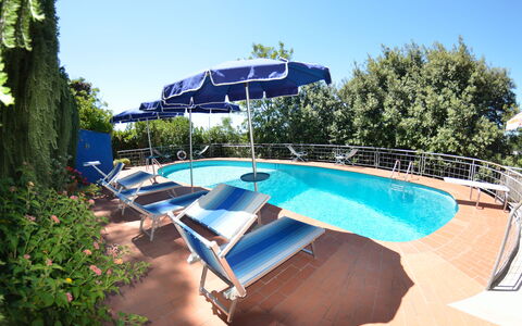 Il Corbezzolo: Swimming Pool, Property, Real Estate, Resort, Leisure, Vacation, Water Park, Shade, Building, Outdoor Furniture