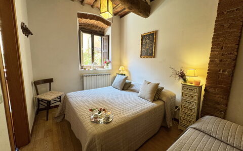 Casina Bella Di Lucca: Wall, Bedroom, Wood, Furniture, Bed, Bed Sheet, Bedding, Interior Design, Flooring, Room
