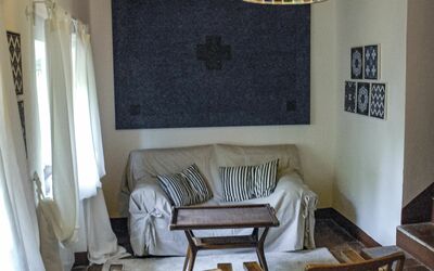 Solaio in Villa: Room, Furniture, Interior Design, Living Room, Property, House, Ceiling, Table, Building, Floor