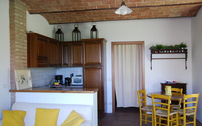 agriturismo-cabbiavoli-chianti-multiproperty-fienile-arancione-pero-living-room