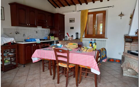 Villetta Di Cortona: Table, Cabinetry, Wood, Interior Design, Building, Chair, Floor, Rectangle, Window, Flooring
