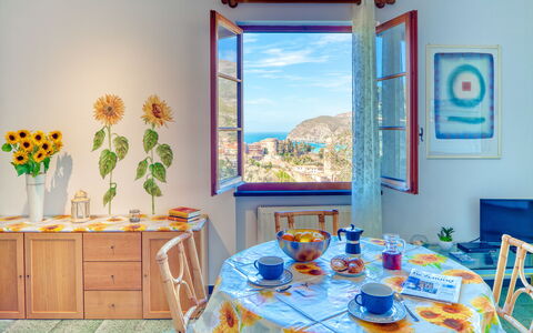 Olivi Del Mesco - Levanto: Room, Blue, Property, Turquoise, Interior Design, Table, Yellow, Azure, Dining Room, Furniture