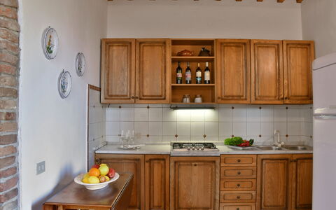 La Capanna: Kitchen, Countertop, Furniture, Cabinetry, Wood, Interior Design, Kitchen Appliance, Flooring, Major Appliance, Cupboard