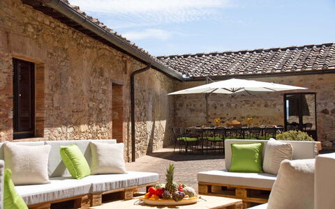 La Corte Di Campalli: Table, Plant, Furniture, Sky, Property, Cloud, Couch, Flowerpot, Houseplant, Shade