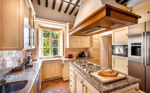 Villa Igea 13: Property, Furniture, Table, Cabinetry, Countertop, Wood, Kitchen, Interior Design, Architecture, Food