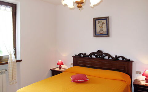 Emilia: Bed, Furniture, Bedroom, Interior Design, Wall, Bed Sheet, Bedding, Wood, Floor, Room