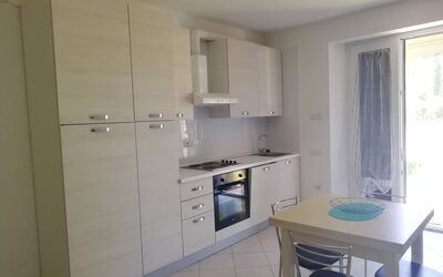 Bilocale 1: Property, Room, Furniture, Building, Interior Design, House, Cabinetry, Kitchen, Real Estate, Floor