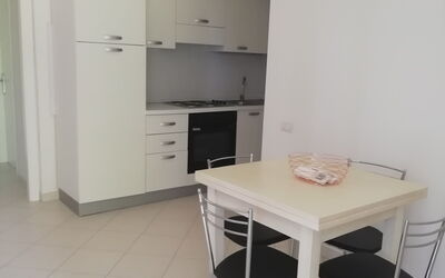 Bilocale 2: Property, Room, Furniture, Floor, Building, Interior Design, House, Kitchen, Table, Real Estate