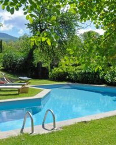 Casa Di Lilli: Water, Plant, Swimming Pool, Sky, Tree, Outdoor Furniture, Cloud, Natural Landscape, Landscape, Grass