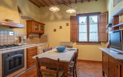 La Bella: Table, Cabinetry, Furniture, Countertop, Window, Chair, Wood, Kitchen, Lighting, Architecture