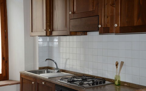 Villa Cincinelli: Countertop, Kitchen, Tile, Room, Property, Cabinetry, Furniture, Floor, Kitchen Sink, Sink