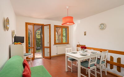 Rododendro - Garden View Ground Floor: Interior Design, Wood, Flooring, Furniture, Ceiling, Floor, Room, Home, Living Room, Wood Stain