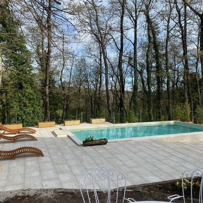 Villa La Casa Bianca: Property, Plant, Sky, Tree, Swimming Pool, Outdoor Furniture, Shade, Interior Design, Grass, Real Estate