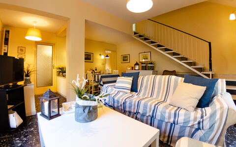 Angelina: Room, Property, Furniture, Building, Interior Design, Living Room, Real Estate, Home, House, Suite