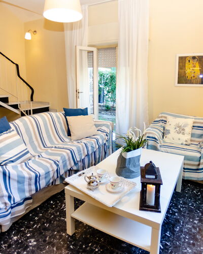 Angelina: Room, Furniture, Property, Living Room, Interior Design, Blue, Yellow, Building, Bedroom, Real Estate