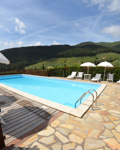 Podere Di Mero Casolare: Sky, Cloud, Water, Building, Swimming Pool, Sunlounger, Outdoor Furniture, Umbrella, Shade, Chair