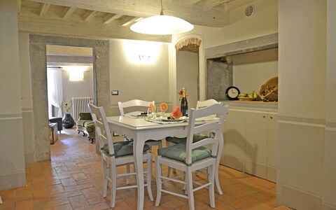 Appartamento Tommasi Fierli: Room, Property, Furniture, Building, Interior Design, Floor, House, Dining Room, Ceiling, Table