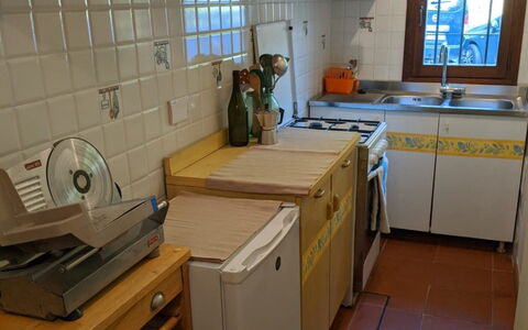 Agriturismo Il Giaggiolo without Pool: Room, Countertop, Property, Kitchen, Cabinetry, Furniture, Floor, Tile, Major Appliance, Building