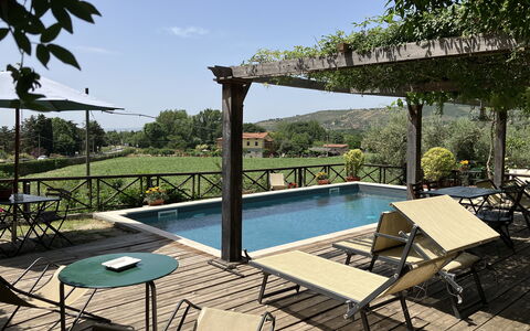 Villa Toppani Del Sodo: Water, Sky, Plant, Property, Swimming Pool, Chair, Shade, Tree, Outdoor Furniture, Condominium