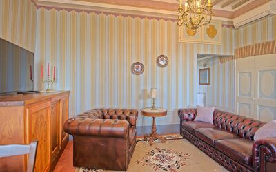 Messere: Wood, Room, Interior Design, Brown, Living Room, Furniture, Chandelier, Couch, Ceiling, Floor