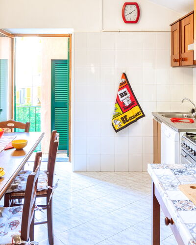 Luigina - Levanto: Room, Lighting, Interior Design, Yellow, Table, Interior Design, Ceiling, Light Fixture, Orange, Kitchen