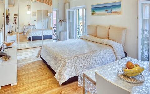 Studio Fede - Levanto: Furniture, Property, Comfort, Building, Window, Blue, Azure, Wood, Bed Frame, Pillow