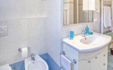 Nina Home - Levanto: Tap, Mirror, Sink, Plumbing Fixture, Bathroom Sink, Property, Photograph, Purple, Bathroom, Azure