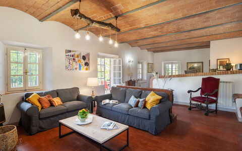 Villa Luana: Couch, Furniture, Table, Property, Picture Frame, Window, Studio Couch, Floor, Wood, Living Room