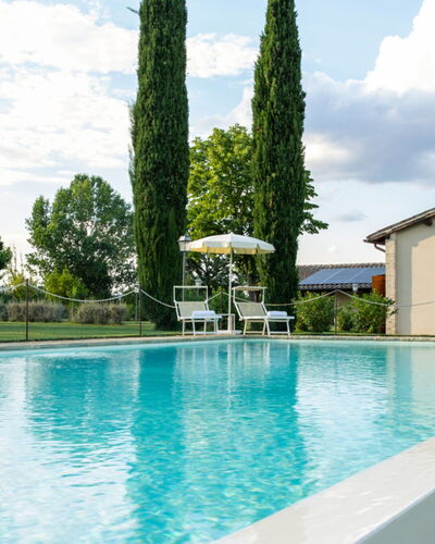 Villa Papiano: Water, Cloud, Sky, Plant, Swimming Pool, Tree, Building, Leisure, Grass, Real Estate