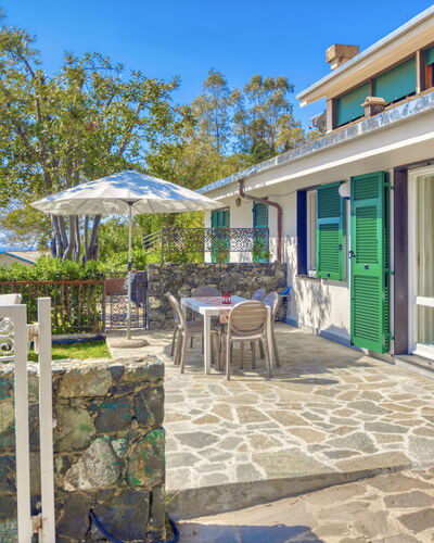 Marlà - Levanto: Sky, Property, Table, Plant, Building, Azure, Shade, Flowerpot, Door, Chair