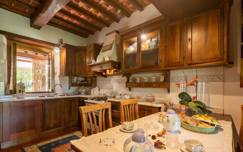 Valdambra Villa: Furniture, Interior Design, Cabinetry, Kitchen, Wood, Flooring, Countertop, Ceiling, Lighting, Room