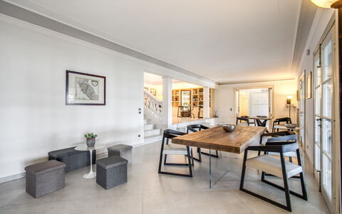 Villa Alfresco: Picture Frame, Furniture, Table, Plant, Houseplant, Building, Interior Design, Living Room, Couch, Flooring