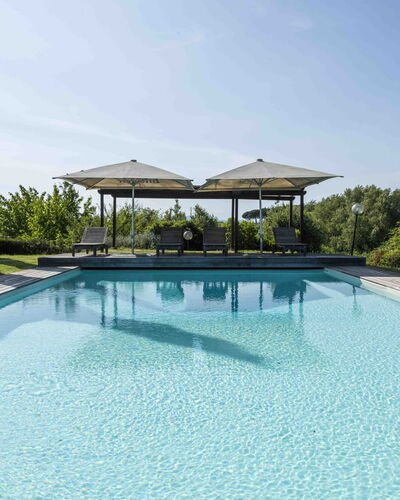 Casina Dell'acquaborra: Blue, Water, Swimming Pool, Shade, Outdoor Furniture, Resort, Eco Hotel, Landscaping, Reflection, Reflecting Pool