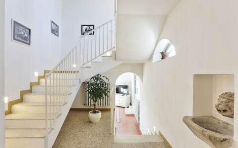 Villa Maona: Building, Plant, Wood, Floor, Flooring, Stairs, Houseplant, Hall, Hardwood
