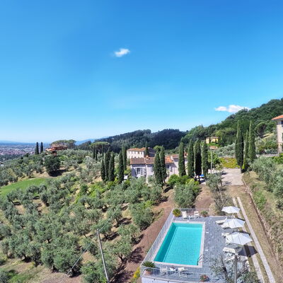 Villa Maona: Sky, Plant, Building, Water, Cloud, Azure, Tree, Vegetation, Urban Design, Residential Area