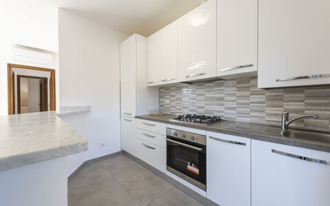 Casa Serchio: Cabinetry, Countertop, Sink, Kitchen Sink, Tap, Building, Kitchen Stove, Wood, Lighting, Interior Design