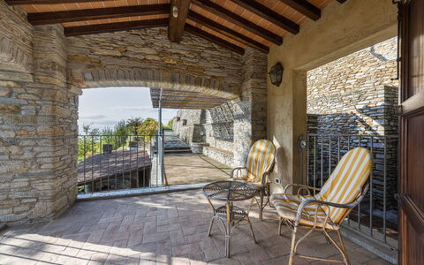 Villa Montignoso: Plant, Furniture, Building, Property, Table, Chair, Wood, Shade, House, Tree