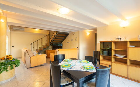 Villa Isola: Table, Building, Furniture, Chair, Lighting, Interior Design, Houseplant, House, Floor, Flooring