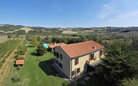 Villa Le Selvole: Sky, Building, Cloud, Property, Window, Ecoregion, Plant, Nature, Tree, Natural Environment