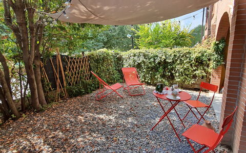 Bianca: Plant, Property, Furniture, Table, Shade, Chair, Outdoor Furniture, Tree, Outdoor Table, Grass