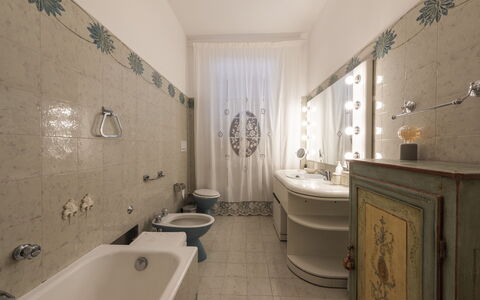 Villa Monteresi: Mirror, Tap, Plumbing Fixture, Sink, Property, Bathroom, Bathroom Sink, Building, Interior Design, Purple
