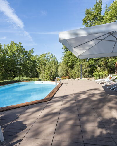 Villa Monteresi: Sky, Water, Cloud, Swimming Pool, Shade, Plant, Outdoor Furniture, Architecture, Tree, Sunlounger
