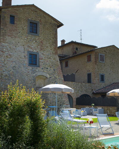 Villa Pianora: Plant, Sky, Water, Building, Swimming Pool, Cloud, Window, Tree, Umbrella, House