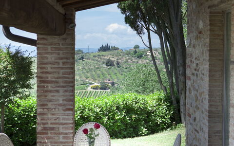 Chianti Fornace 1: Furniture, Sky, Plant, Building, Chair, Tree, Shade, Porch, Table, Outdoor Furniture