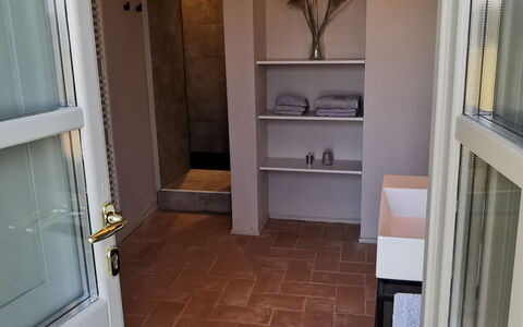 Casa Insieme: Cabinetry, Property, Wood, Door, House, Flooring, Floor, Interior Design, Wood Stain, Kitchen