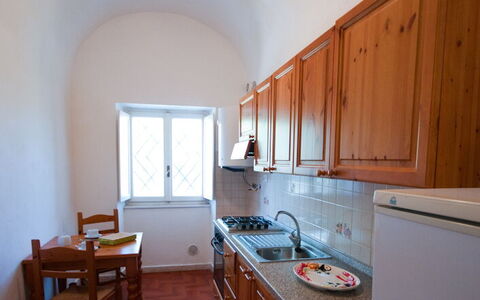 Holiday Home Giannella: Cabinetry, Furniture, Property, Countertop, Kitchen Sink, Window, Building, Wood, Sink, Kitchen