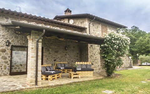 Villa San Leo: Cloud, Plant, Building, Property, Sky, Furniture, Outdoor Bench, Window, Shade, Tree