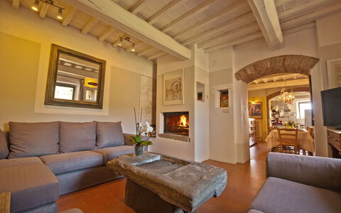 Villa Badia: Furniture, Couch, Table, Picture Frame, Interior Design, Living Room, Houseplant, Floor, Comfort, Flooring